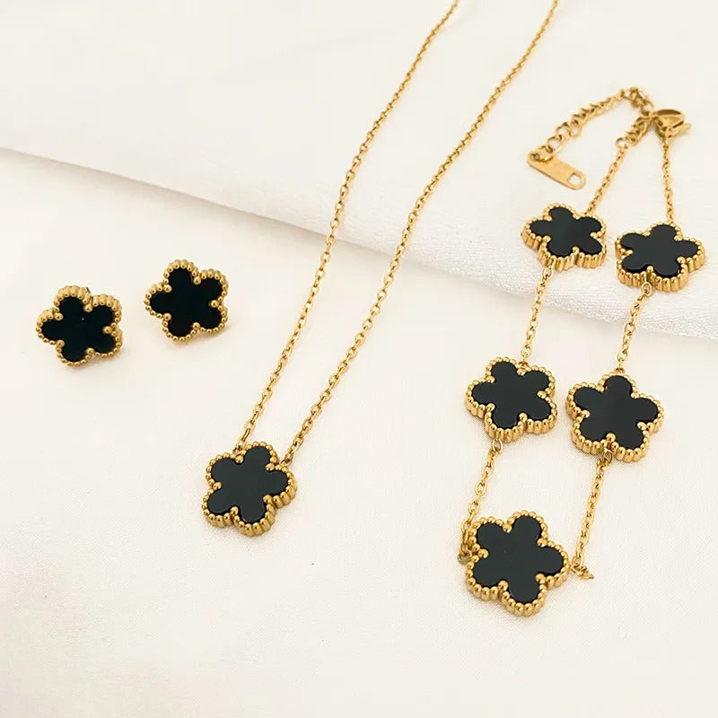 pair of stud earrings, necklace, bracelet